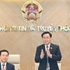 越南国会主席王廷惠同通信传媒部举行工作会议【组图】