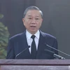 越共中央政治局委员、国家主席、治丧委员会主任苏林在追悼会上致悼词。