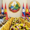 越南国家主席梁强会见老挝政府总理宋赛·西潘敦。