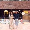 越新两位总理夫人参观越南民族学博物馆