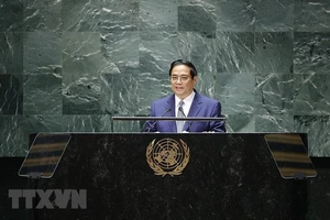 越南政府总理范明正在第78届联合国大会一般性辩论发表讲话。（图片来源：越通社）