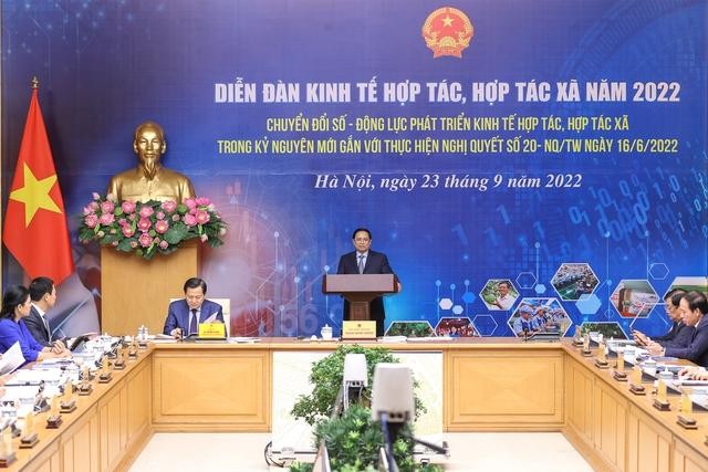 越南政府总理范明正主持召开2022年合作社和合作经济论坛。（图片来源：VGP）