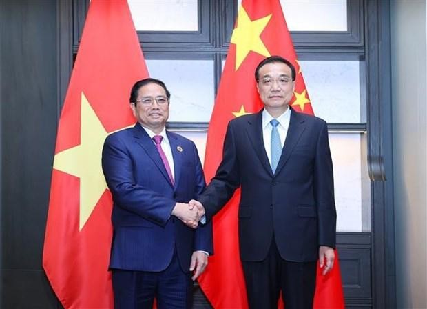 范明正总理会见中国国务院总理李克强。（图片来源：越通社）