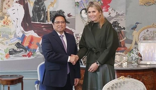越南政府总理范明正会见荷兰王后马克西马。（图片来源：越通社）