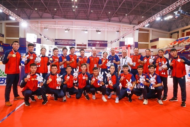 越南踢拳队为越南体育代表团获得第136枚金牌。（图片来源：越通社）