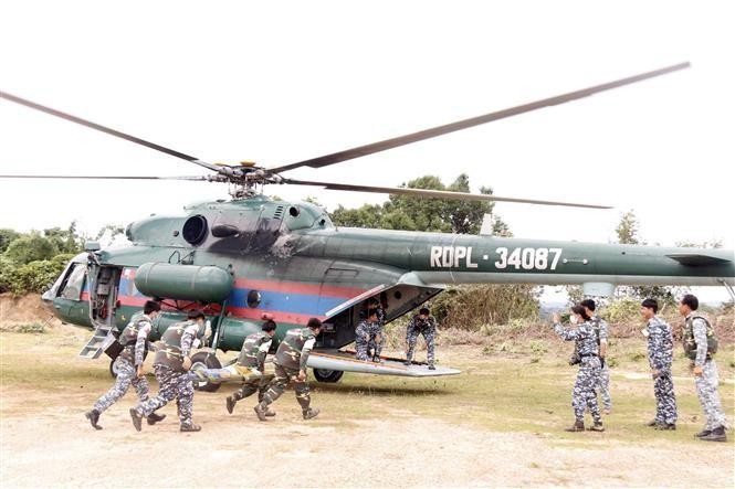 老越柬三国军队联合救援演练首次在万象举行。（图片来源：越通社）