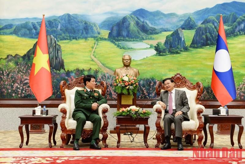 梁强大将拜会老挝人民革命党中央委员会总书记、国家主席通伦•西苏里。