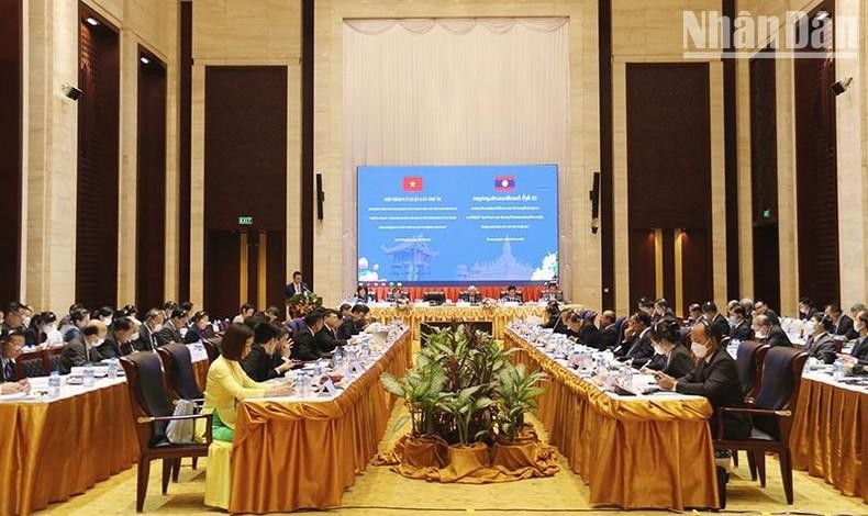 越南共产党与老挝人民革命党第九次理论研讨会场景。