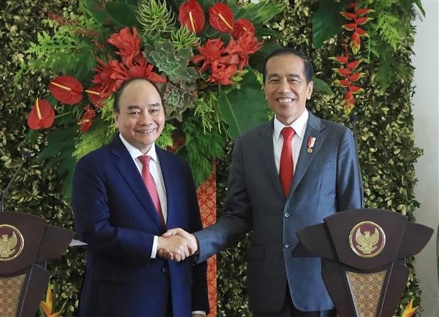 越南国家主席阮春福与印尼总统佐科·维多多。