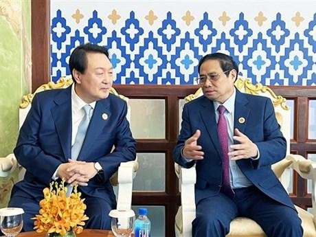 范明正总理会见韩国总统尹锡悦。