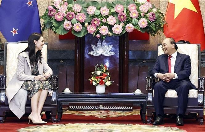 国家主席阮春福会见杰辛达·阿德恩总理。