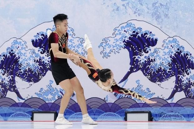 越南健美操队郑光孟和潘氏渊二两名运动员。