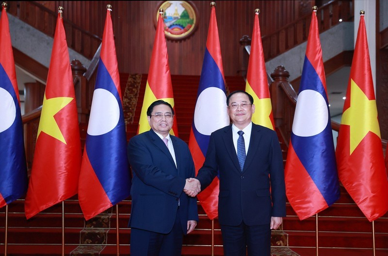 越南政府总理范明正与老挝政府总理宋赛·西潘敦。
