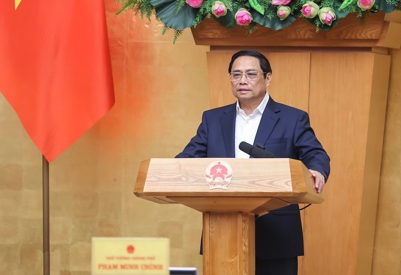 越南政府总理范明正主持4月政府例会。（图片来源：陈海 摄）