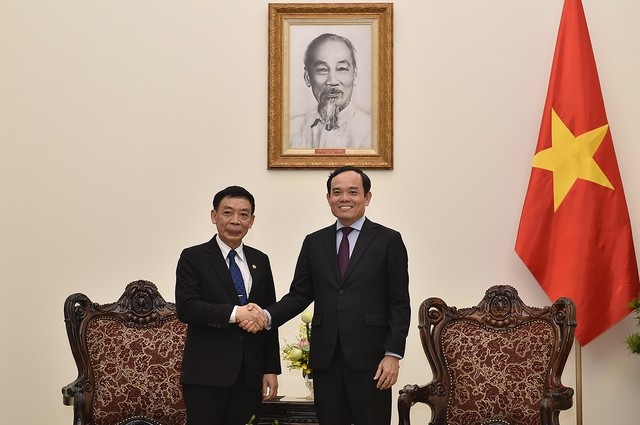 越南政府副总理陈流光会见老挝内政部部长。（图片来源：VGP）