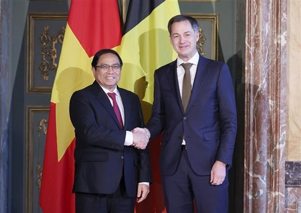 越南政府总理范明正与比利时首相亚历山大·德克罗。