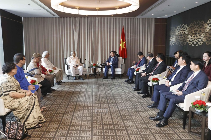 越南国会主席王廷惠会见孟加拉国共产党总书记沙阿·阿拉姆。（图片来源：越通社）