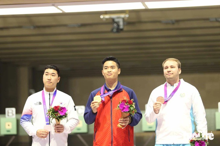 枪手光辉在第19届亚运会上为越南夺得首枚金牌。（图片来源：年轻人报网）