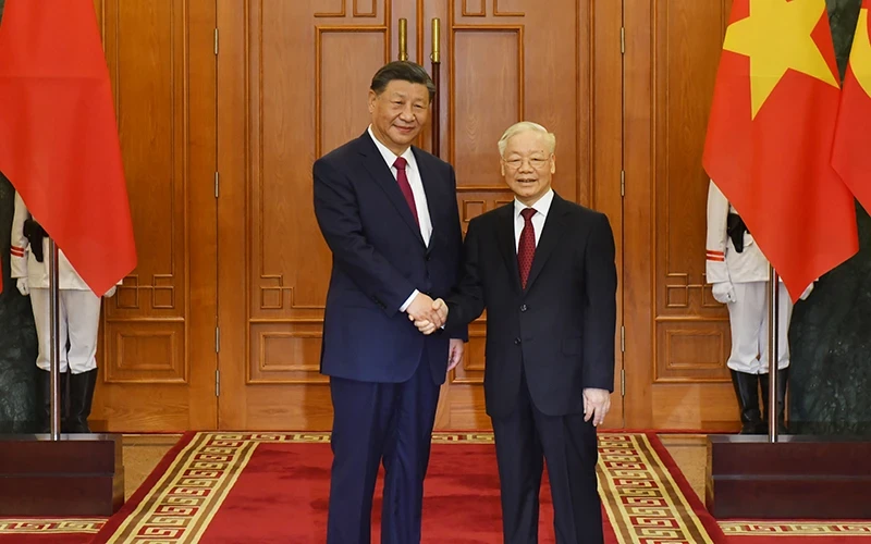 越共中央总书记阮富仲与中共中央总书记、中国国家主席习近平。