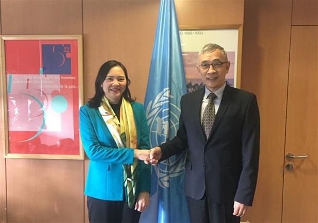 新任越南常驻联合国教科文组织代表团团长阮氏云英大使与教科文组织副总干事曲星。