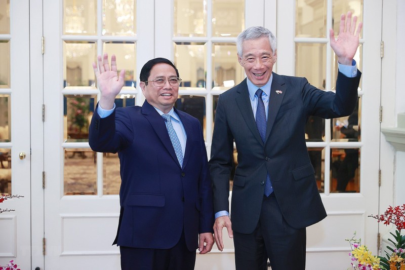 越南政府总理范明正与新加坡总理李显龙。（图片来源：越通社）