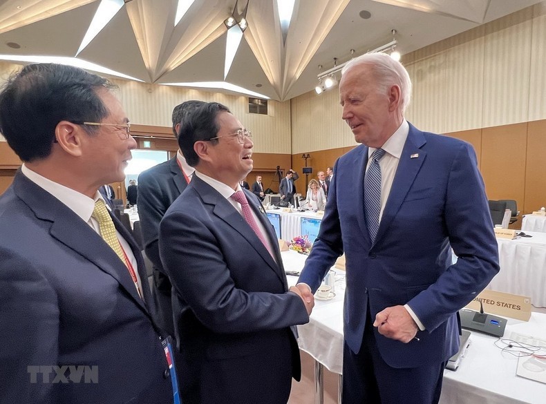 越南政府总理范明正会见美国总统乔·拜登。（图片来源：越通社）
