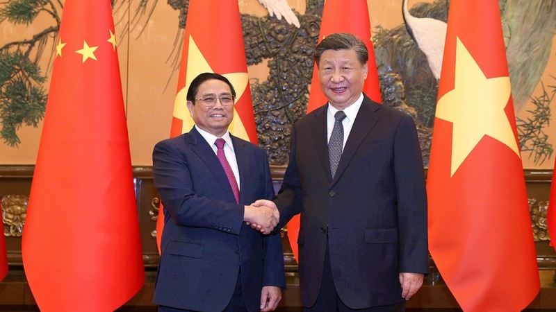 越南政府总理范明正会见中共中央总书记、中国国家主席习近平。