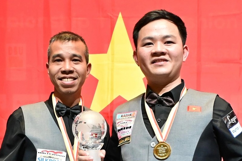 越南台球（Billiard）队两名队员陈决战（Tran Quyet Chien）和包方荣（Bao Phuong Vinh）。