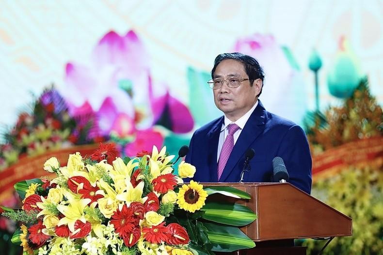 越南政府总理范明正在纪念大会上发言。（图片来源：越通社）