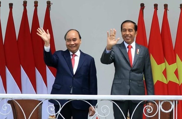 越南国家主席阮春福与印尼总统佐科·维多多。