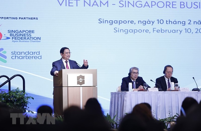 越南政府总理范明正在越新企业论坛上发表讲话。（图片来源：越通社）