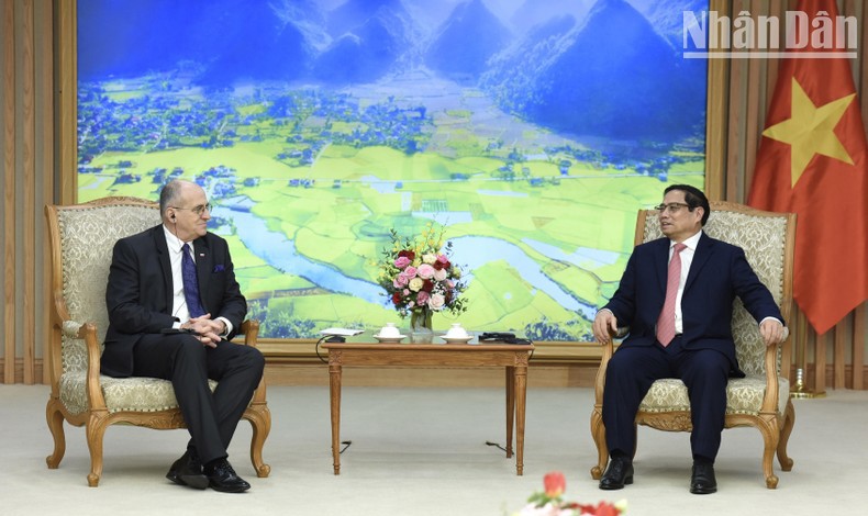 越南政府总理范明正与波兰外交部部长兹比格涅夫·劳。（陈海 摄）