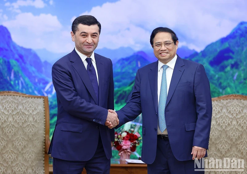 越南政府总理范明正会见乌兹别克斯坦外交部长赛义多夫。
