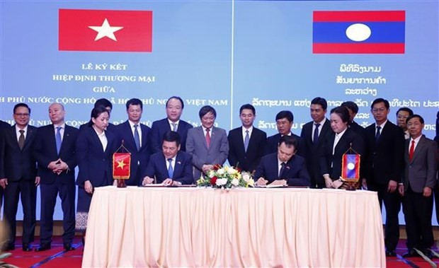 越南与老挝签署新贸易协定。