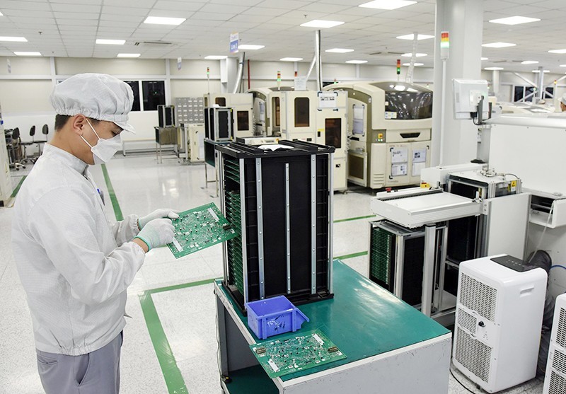 越南电子Bumjin有限责任公司的电子零配件生产。（安安 摄）