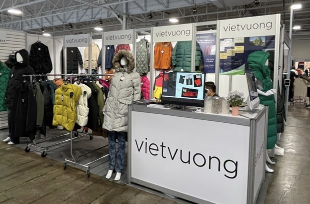 越王在在2023年加拿大多伦多纺织服装展览会设立的展位。（图片来源：越通社）