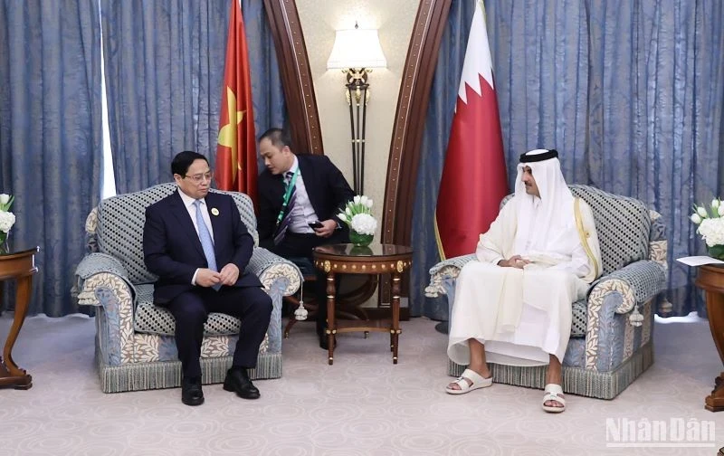 越南政府总理范明正会见卡塔尔王储塔米姆。