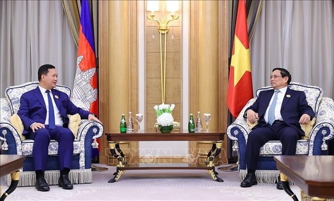 越南政府总理范明正会见柬埔寨首相洪玛奈。（图片来源：越通社）