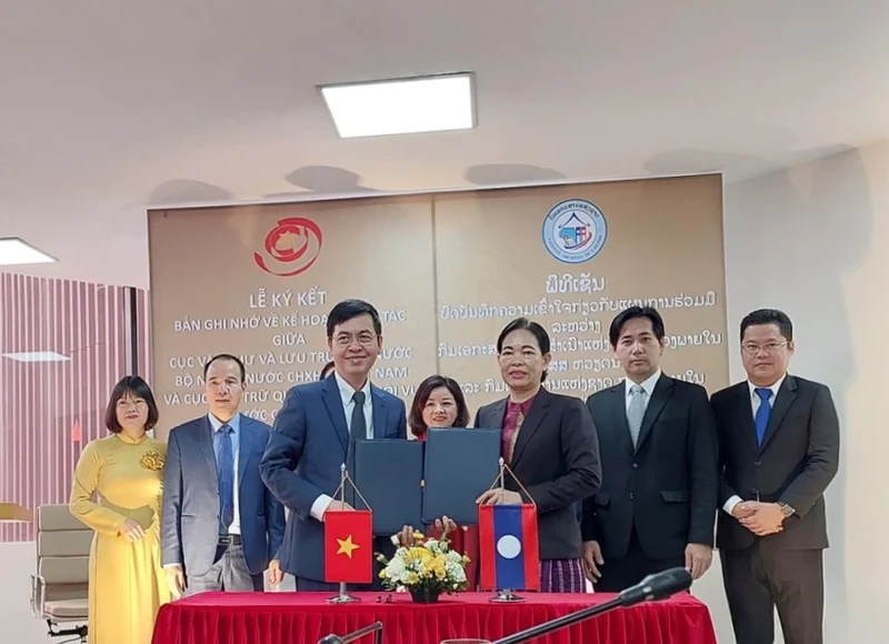 越南与老挝签署文书档案领域的合作谅解备忘录。（图片来源：越通社）