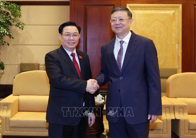越南国会主席王廷惠会见中共中央政治局委员、上海市委书记陈吉宁。