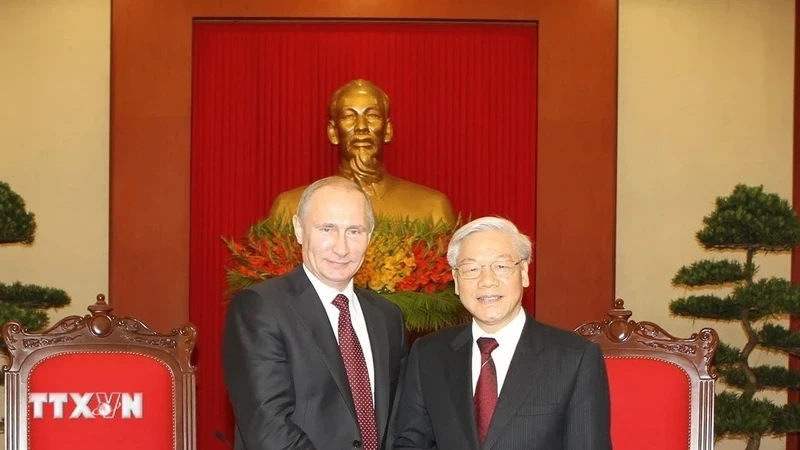 阮富仲总书记2013年会见对越南进行国事访问的普京总统。（图片来源：越通社）
