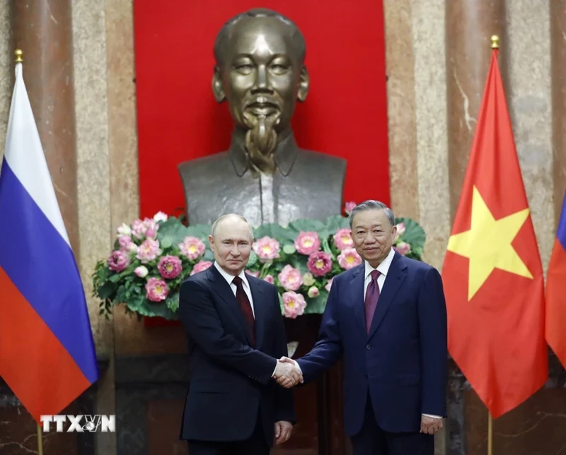 苏林主席和普京总统。（图片来源：越通社）