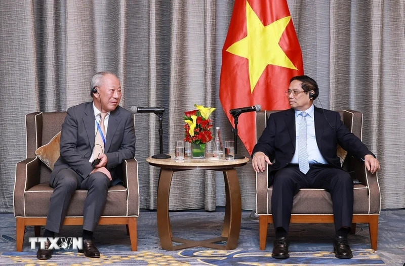 范明正总理已会见中国太平洋建设集团创始人、庄严智库理事长严介和。（图片来源：越通社）