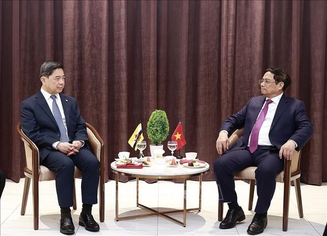 范明正总理会见文莱经济部第二部长刘光明。