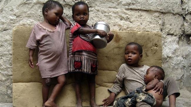 冲突和暴力在世界许多地区造成饥荒，儿童是最脆弱的群体。（图片来源：法新社）