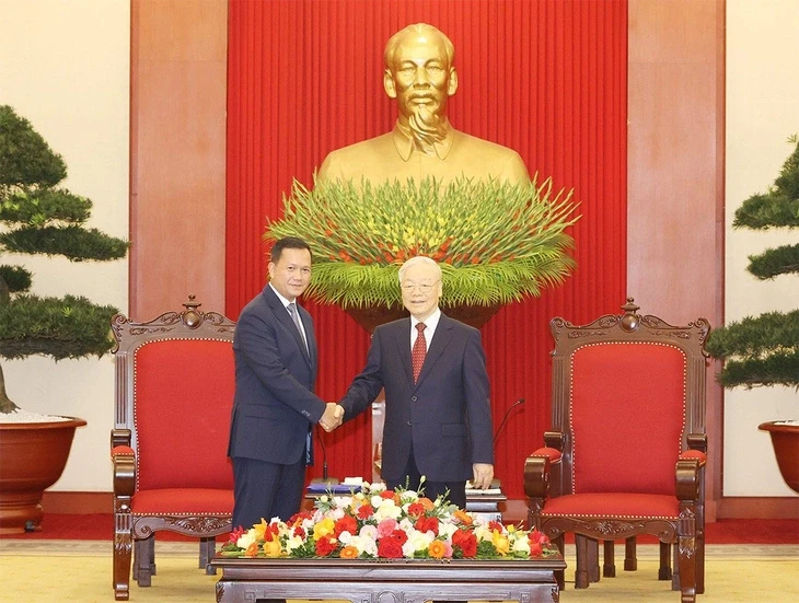 越共中央总书记阮富仲会见柬埔寨首相洪玛奈。（图片来源：越通社）