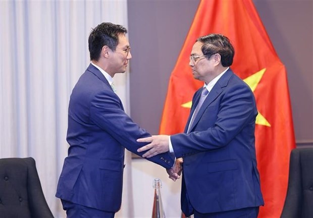 越南政府总理范明政会见澳大利亚麦格理集团旗下Corio公司领导代表。（图片来源：越通社）