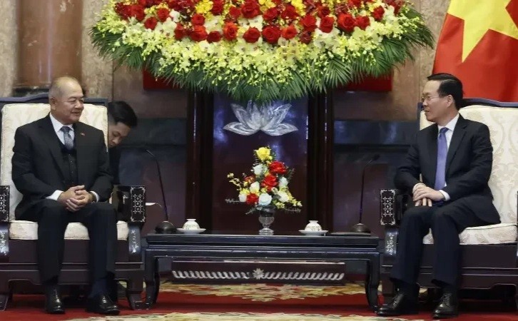 越南国家主席武文赏会见老挝政府副总理吉乔·凯坎匹吞。
