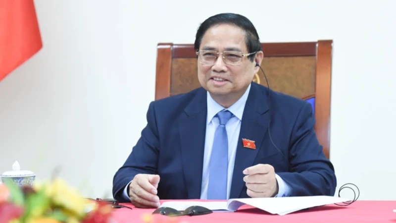 越南政府总理范明正与新加坡总理黄循财通电话。