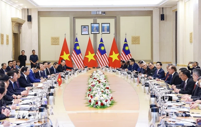 会谈全景。（图片来源：越通社）